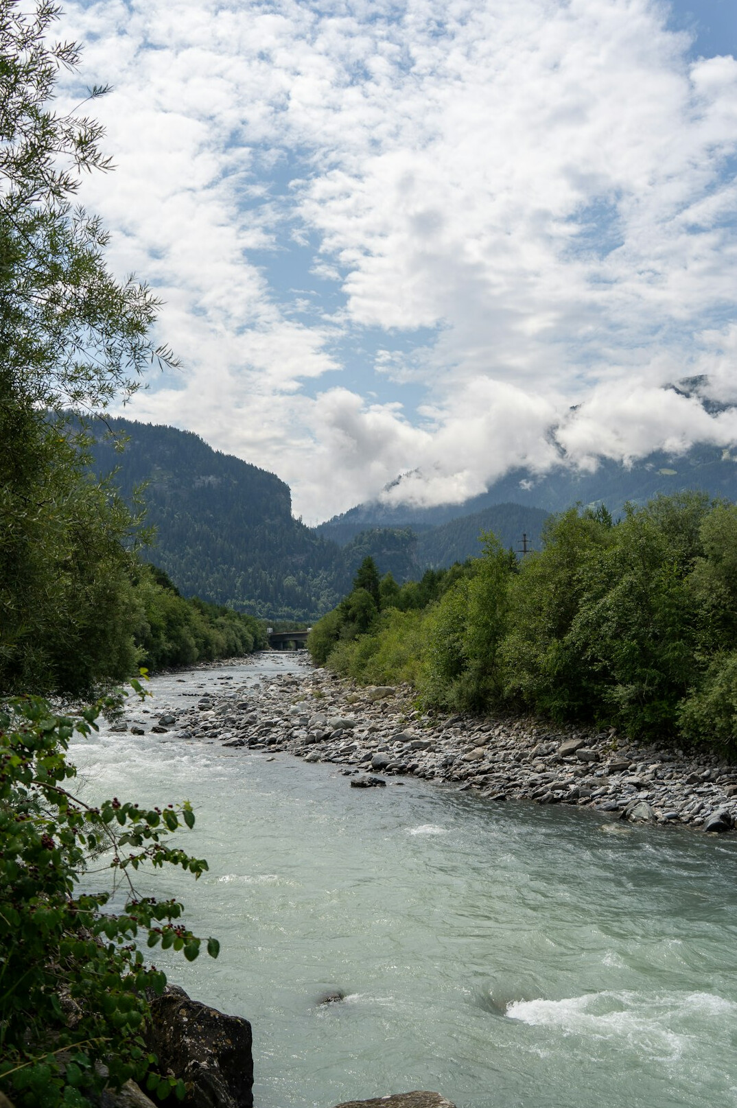 Alpine river flowing through a Swiss valley
