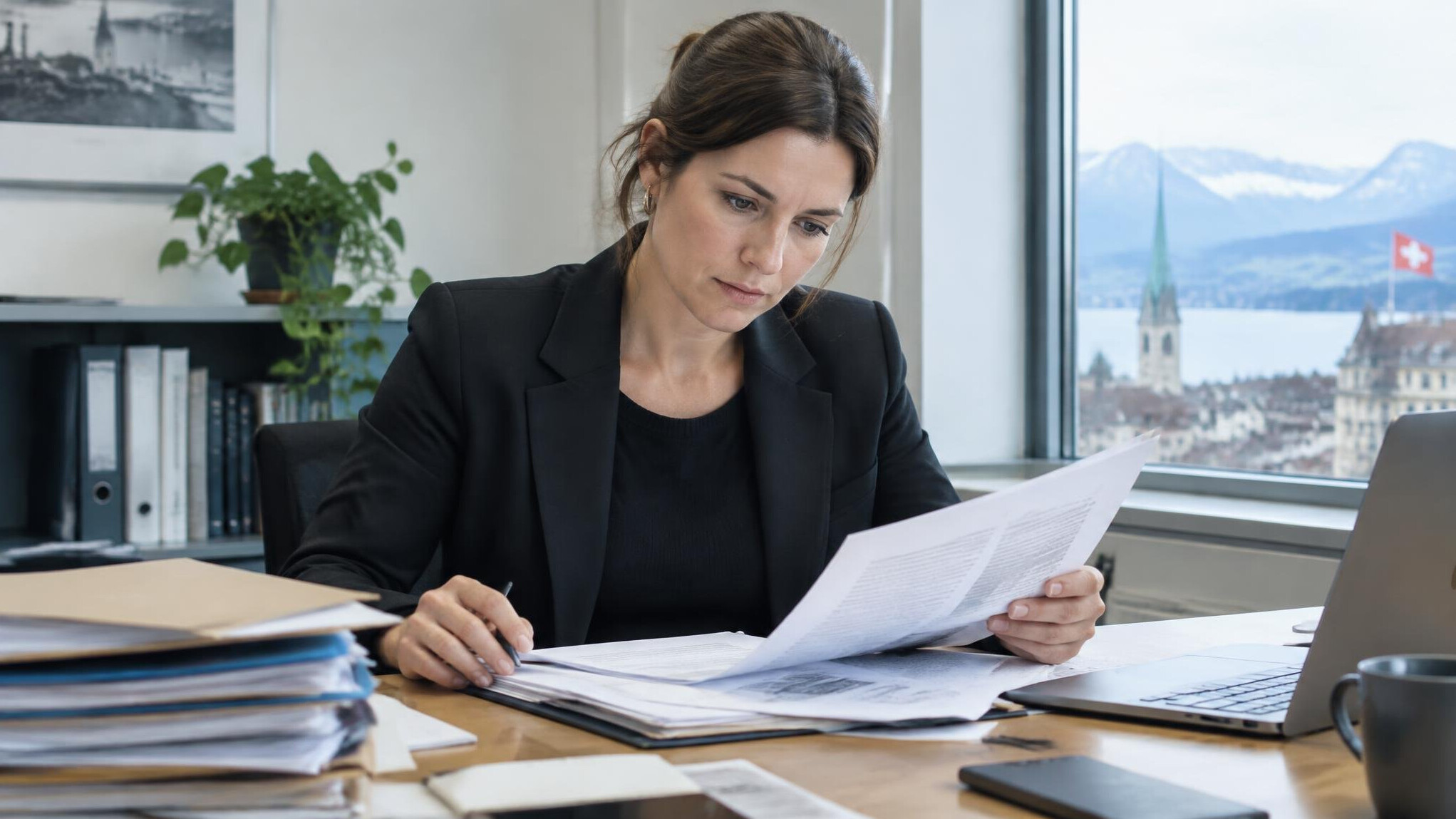 Swiss journalist reviewing documents at a desk