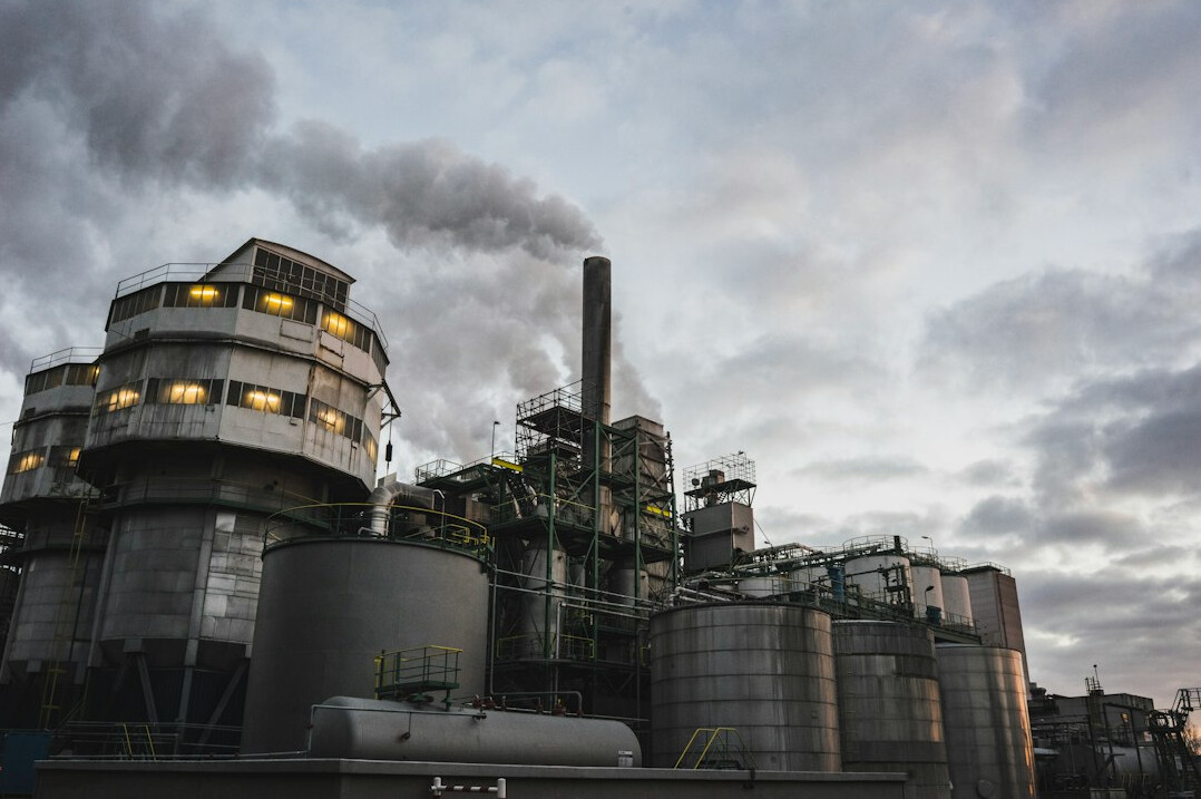 Industrial factory with smoke stacks
